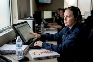 EMS dispatcher at work in office setting