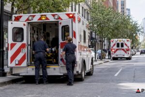 EMS ambulances positioned at separate municipal posts