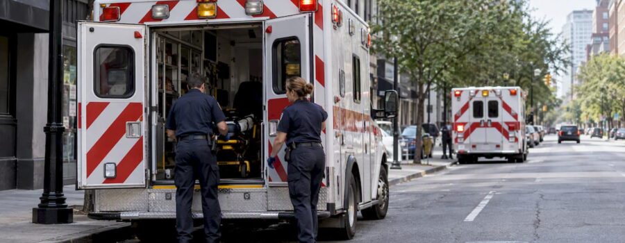EMS ambulances positioned at separate municipal posts