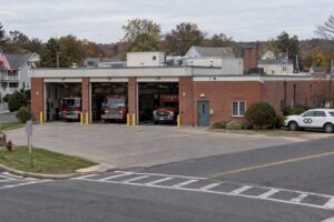Municipal fire EMS station beside intersecting roads