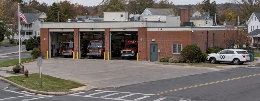 Municipal fire EMS station beside intersecting roads